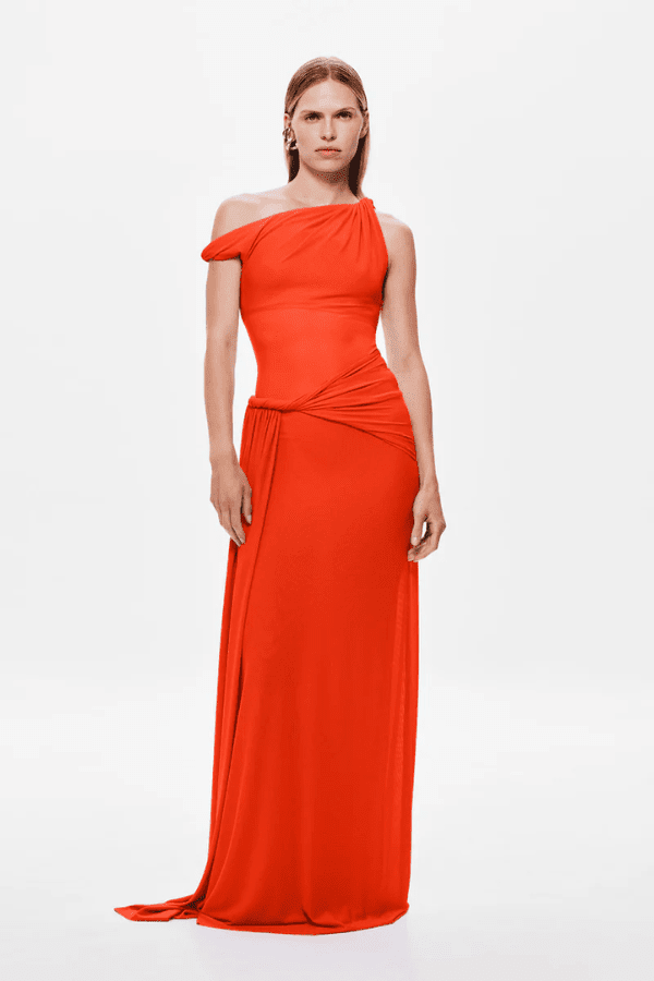 Sisal Mesh Dress Chilli by Misha – Trendy flowing maxi with twisted off-shoulder, sheer mesh bodice, and cascading sash, perfect for elegant day-to-evening wear and special occasions.