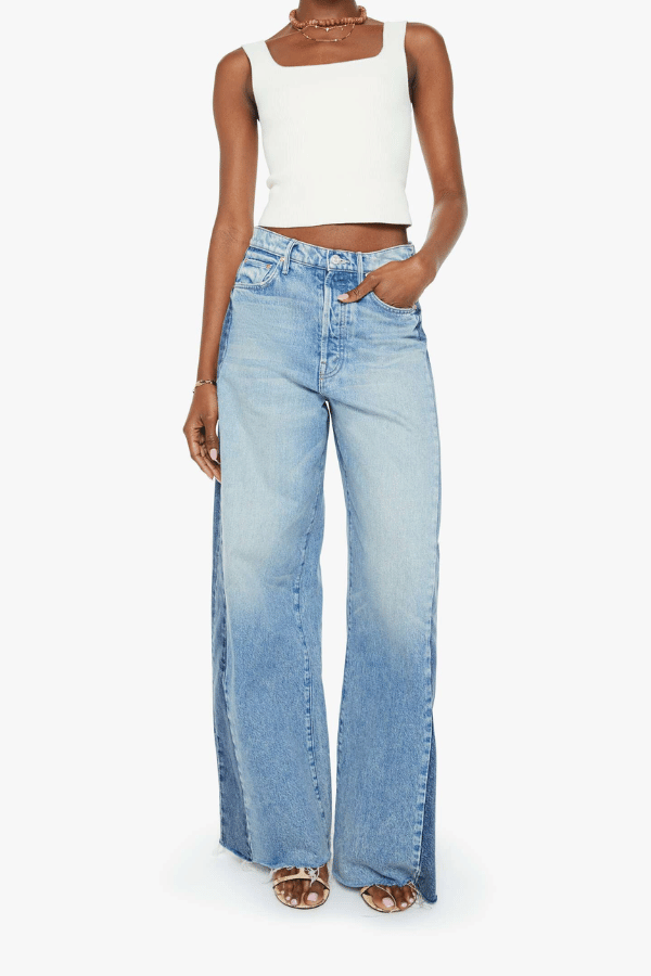 Pipe Dream Button Sneak Fray in Blinded By The Dark by MOTHER, Super high-rise rigid jeans with barrel-leg fit and frayed hem for vintage-meets-modern style.