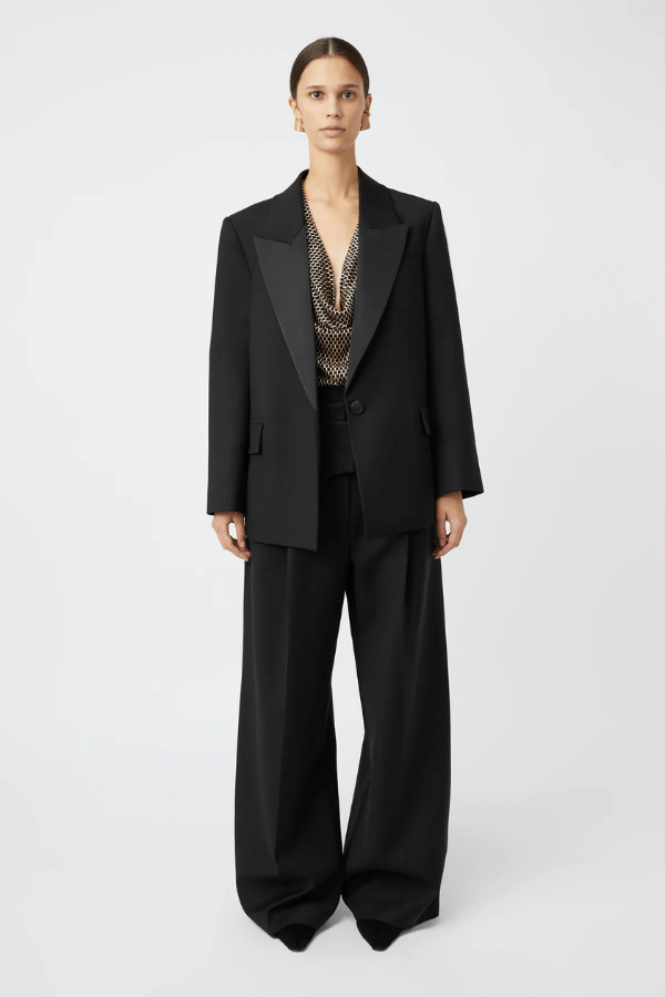 Natalini Blazer Black by Camilla and Marc – Elegant blazer crafted from luxurious Australian wool with sleek satin lapels, forward-rolling shoulders, and a raised swinging back hem.