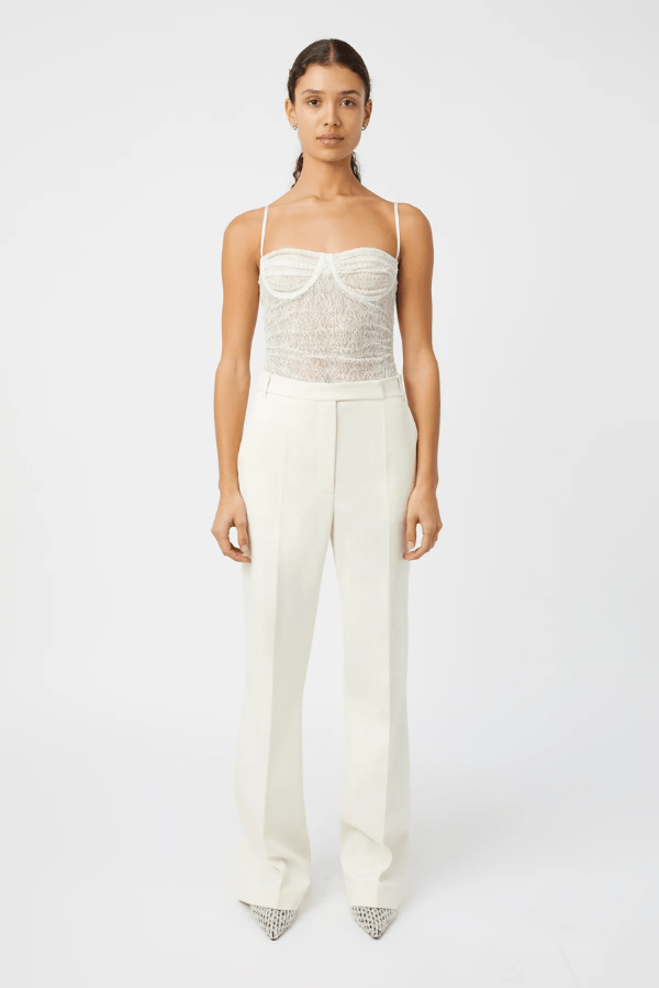 Aperture Bodysuit Ivory by Camilla and Marc – sheer lace with underwire and G-string cut, a refined yet sensual piece perfect for layering or statement styling.