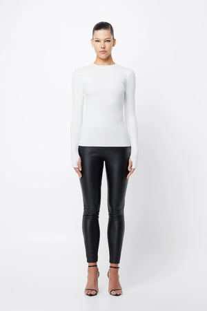 The Brooklyn Top White by Mossman, lightweight and super soft knitwear with thumb sleeve openings and a high round neckline, perfect for trendy layering days.