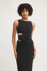 Valentina Dress Black by Tojhà – Sleek crepe maxi with curved waist cut-out and mesh detail, perfect for formal nights or chic events.