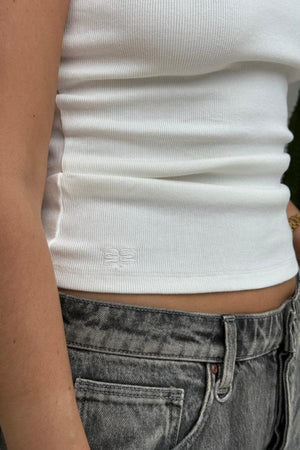 Sophie Tank Black by Sneaky Link – A versatile, soft cotton blend tank with delicate straps and flattering neckline, perfect for year-round layering and effortless style.