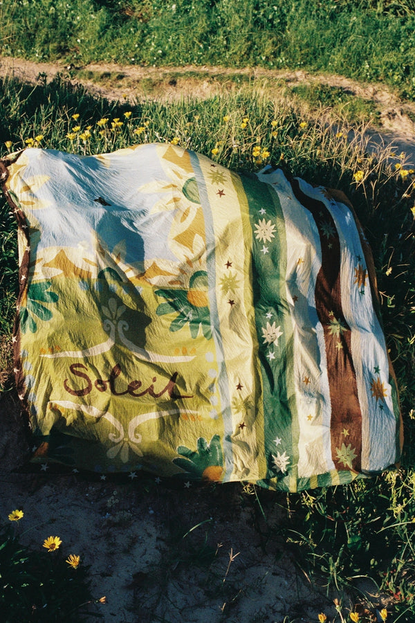 Square Pareo Sundrop by Soleil Soleil, lightweight cotton pareo with a semi-sheer finish for beach days and resort escapes.