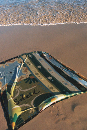 Square Pareo Sundrop by Soleil Soleil, lightweight cotton pareo with a semi-sheer finish for beach days and resort escapes.