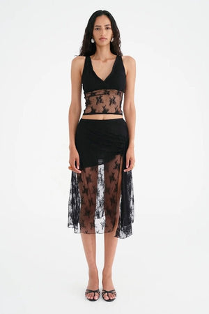 Margot Lace Tank Black by Benni — Romantic V-neck stretch lace tank with fully lined bust and sheer waist. Finished with lingerie trim. Pair with Flynn Midi Skirt.