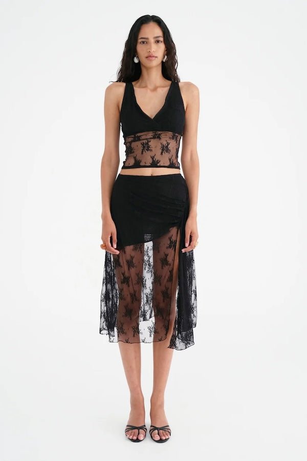 Margot Lace Tank Black by Benni — Romantic V-neck stretch lace tank with fully lined bust and sheer waist. Finished with lingerie trim. Pair with Flynn Midi Skirt.