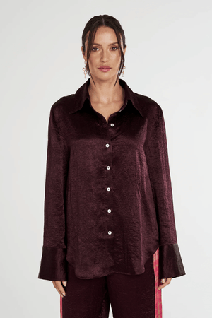 Cuff Shirt Plum by Summi Summi — Silky lightweight shirt with a structured collar and flared oversized cuffed sleeves. Crafted from 100% acetate woven fabric.