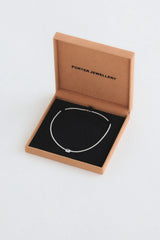 Heirloom Tennis Necklace by Porter Jewellery — a white gold vermeil necklace with precision-set CZ stones for a seamless, brilliant finish.