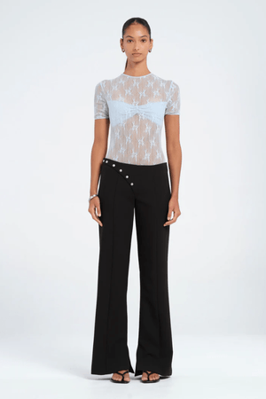 Porter Bodysuit Blue by Benni — Stretch lace bodysuit with high neck, soft jersey lining, open back with hook-and-eye closure, G-string panty, and snap crotch for sleek, practical style.