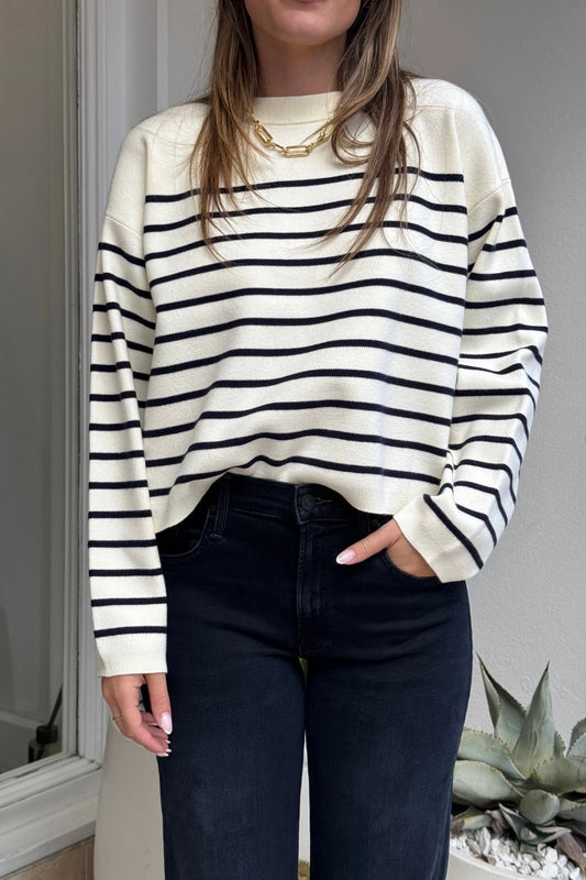 Marta Sweater Navy Breton by Onte – Soft-touch souffle knit sweater with a boxy cropped fit. Features classic navy Breton stripes, ribbed neck, cuffs, and hem. Heavyweight, relaxed A-line silhouette.