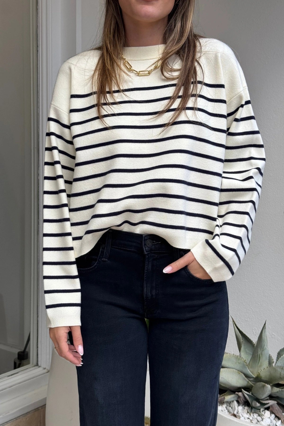 Marta Sweater Navy Breton by Onte – Soft-touch souffle knit sweater with a boxy cropped fit. Features classic navy Breton stripes, ribbed neck, cuffs, and hem. Heavyweight, relaxed A-line silhouette.