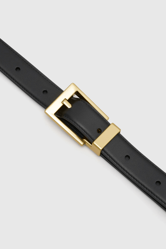 Lloyd Belt Gold Black by Camilla and Marc – Vachetta leather belt with bold gold buckle and fine texture, designed for elevated everyday wear.