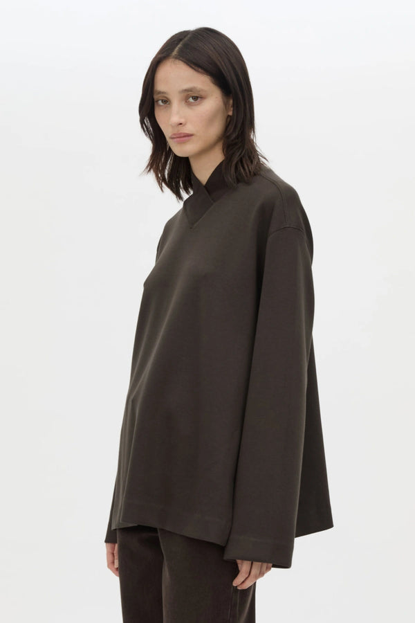 Bessette Long Sleeve Top in Espresso by Camilla and Marc, a sleek high-neck layer with side splits and tonal seam detailing.