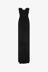 The Florence Jersey Dress by MISHA, a strapless black maxi with plunge neckline and ruching. Perfect for black-tie or evening events.