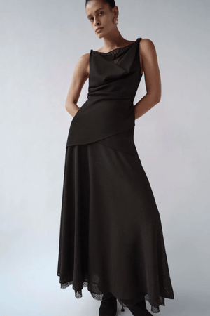 Attar Top Black by Camilla and Marc – draped cowl neck with twisted straps and deep V-back, perfect for elegant dinners or chic evening events.