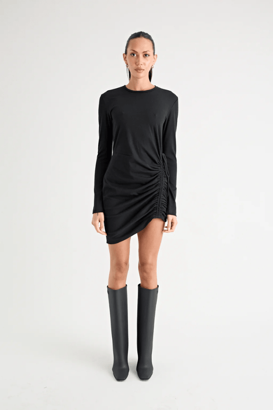 Rule Eight Dress Black by Pfeiffer – A trendy and versatile cotton mini dress with adjustable side ruching, crew neckline, and full sleeves. Perfect for stylish day-to-night wear.