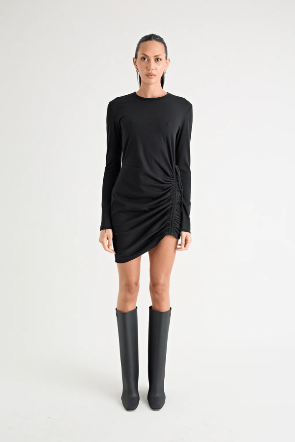 Rule Eight Dress Black by Pfeiffer – A trendy and versatile cotton mini dress with adjustable side ruching, crew neckline, and full sleeves. Perfect for stylish day-to-night wear.