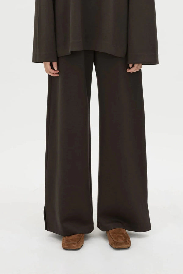 Bessette Pant in Espresso by Camilla and Marc, a tailored mid-rise lounge pant with hem splits for modern everyday polish.
