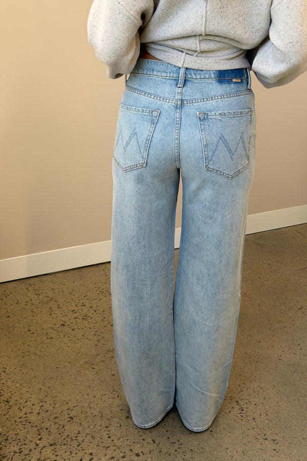 I Could Care Less Jeans by MOTHER – a slouchy low-rise jean with straight leg and faded wash. Perfect for relaxed everyday wear.