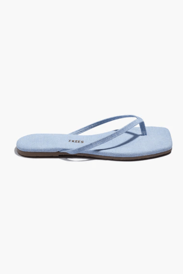Square Toe Lily Washed Denim by Tkees, a square-toe slide sandal in soft washed denim with a cushioned denim insole and rubber outsole. Handcrafted in Brazil for comfort and style.