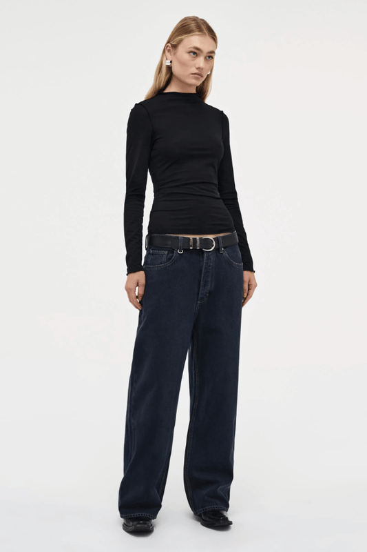Yoko Baggy Send Off Mid Vintage Indigo by Neuw Denim, trendy oversized baggy jeans with a low-rise waist and ultra-relaxed fit. Perfect for a slouchy, lived-in look with styling versatility, crafted from rigid denim that molds to your shape over time.