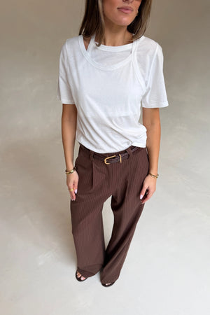 Layered Tee in White by Sneaky Link, 100% cotton with a relaxed fit and layered neckline detail. Perfect for elevated casual dressing.
