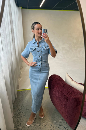 Katrina Denim Midi Dress in Light Blue Wash by Sneaky Link, stretch denim dress with cinched waist and button-up front.