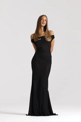 Anita Dress Black by Natalie Rolt featuring a sheer georgette silhouette, draped cowl neckline and asymmetrical skirt godets.