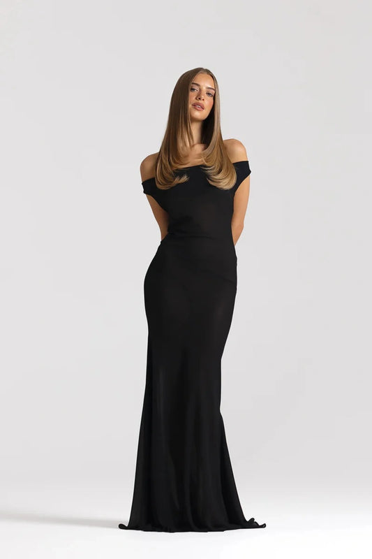 Anita Dress Black by Natalie Rolt featuring a sheer georgette silhouette, draped cowl neckline and asymmetrical skirt godets.