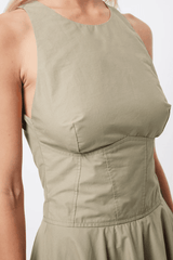 Homage Maxi Dress Eucalyptus by Mossman – A trendy, breathable cotton maxi with a flattering A-line flare and sleek design, perfect for stylish warm-weather days.