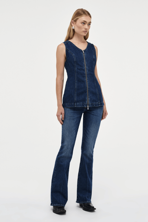 Milla Zip Tunic Dark Indigo by Neuw Denim, trendy slim-fit denim vest with a double-ended zipper for adjustable styling. Perfect for a modern or '70s-inspired look, crafted from rigid denim that molds to your body over time.