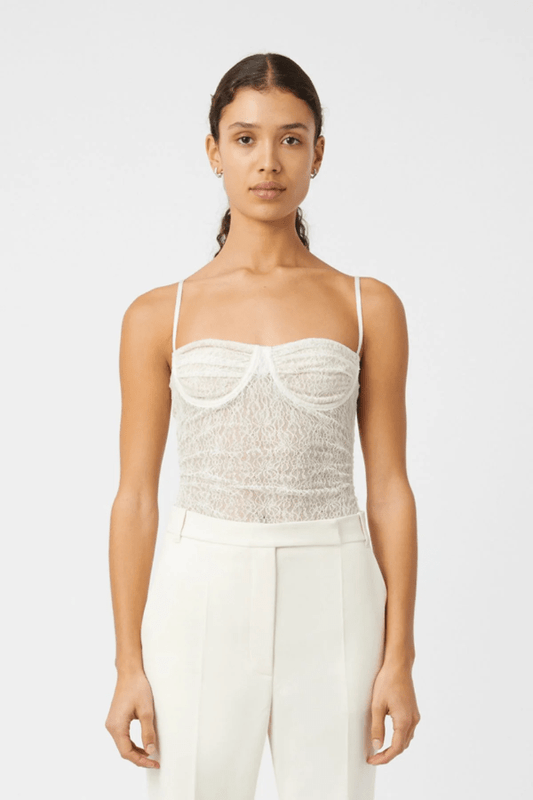 Aperture Bodysuit Ivory by Camilla and Marc – sheer lace with underwire and G-string cut, a refined yet sensual piece perfect for layering or statement styling.