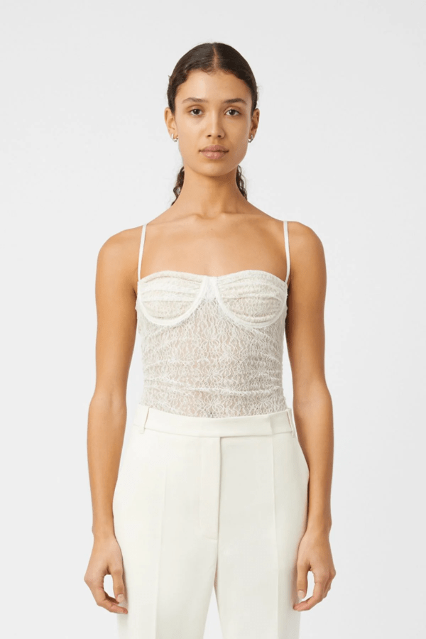 Aperture Bodysuit Ivory by Camilla and Marc – sheer lace with underwire and G-string cut, a refined yet sensual piece perfect for layering or statement styling.