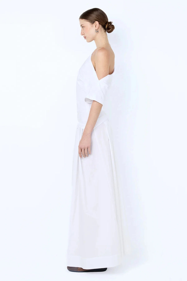 Chantal Off-Shoulder Maxi Dress by Bec + Bridge, this cotton dress features a poplin skirt and jersey bodice. Perfect for summer events.