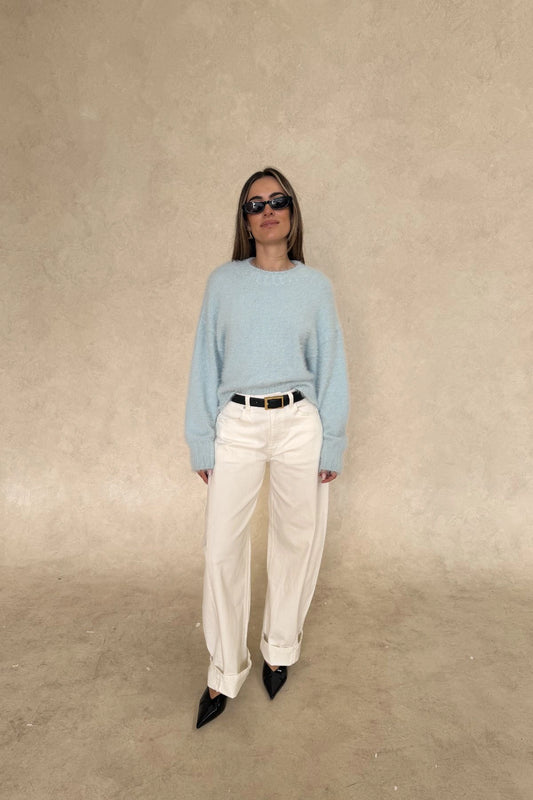 Blue Kaia crew neck sweater with long sleeves and a relaxed fit.