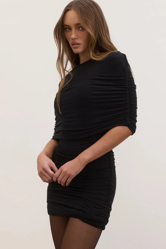 Bayse Daisy Dress in Shadow, a ruched mini dress with high neckline and sculpted fit for modern, versatile styling.