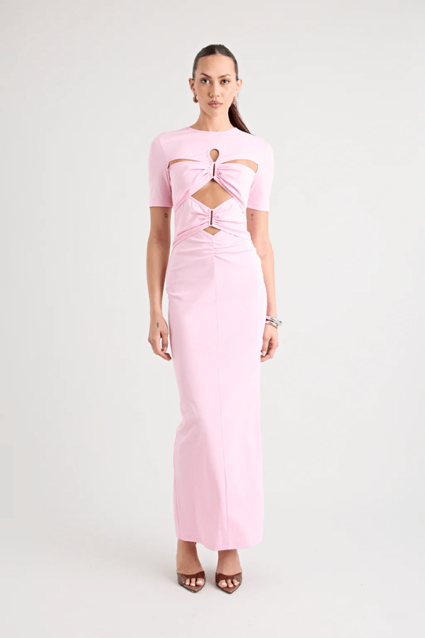 Florence Dress Pink by Pfeiffer – A trendy fitted maxi with cut-out hardware accents, crafted from soft cotton-spandex. Perfect for chic, ethical day-to-night wear. Made in Australia with care.