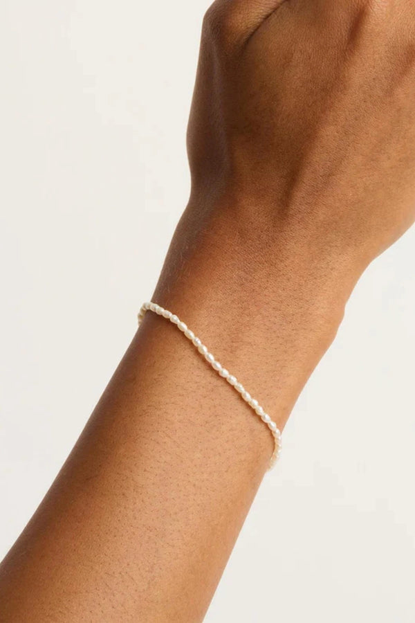 Moonlight Bracelet by By Charlotte, an 18k gold vermeil piece with freshwater pearls. Perfect for meaningful everyday layering.