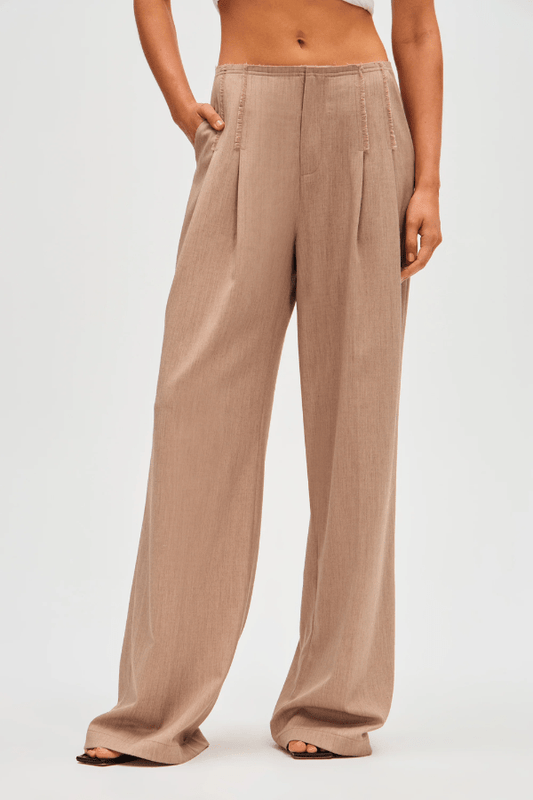 Simone Pant taupe by Misha, wide-leg pants with trendy frayed details and front pleats, perfect for casual or formal wear with a relaxed fit.