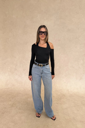 Issy Long Sleeve Top Black by Sneaky Link – Luxuriously soft modal-spandex with an off-shoulder neckline and built-in halter for support. Delicate fabric; handle gently. Cold hand wash.