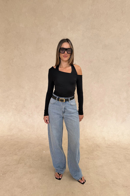 Issy Long Sleeve Top Black by Sneaky Link – Luxuriously soft modal-spandex with an off-shoulder neckline and built-in halter for support. Delicate fabric; handle gently. Cold hand wash.