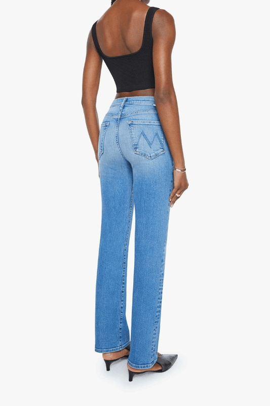 The Kick It Fan Favorite by MOTHER, trendy high-rise straight-leg jeans with a clean hem. Perfect for everyday wear with a mid-blue wash, subtle whiskering, and soft stretch denim for all-day comfort.