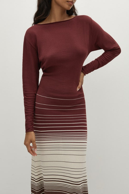 Faithfull the Brand Idun Maxi Dress in Accordion Stripe Bordeaux, knit maxi with boat neckline, twist back detail, and flared skirt.