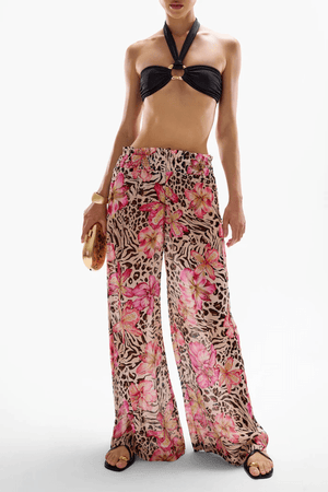 Mission Pants Safaria by Cin Cin, wide-leg pants in vibrant ‘Safaria’ print with a shirred elastic waistband. Lightweight 100% viscose, perfect for resort and summer wear.