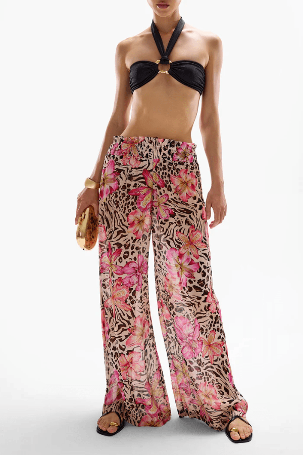 Mission Pants Safaria by Cin Cin, wide-leg pants in vibrant ‘Safaria’ print with a shirred elastic waistband. Lightweight 100% viscose, perfect for resort and summer wear.