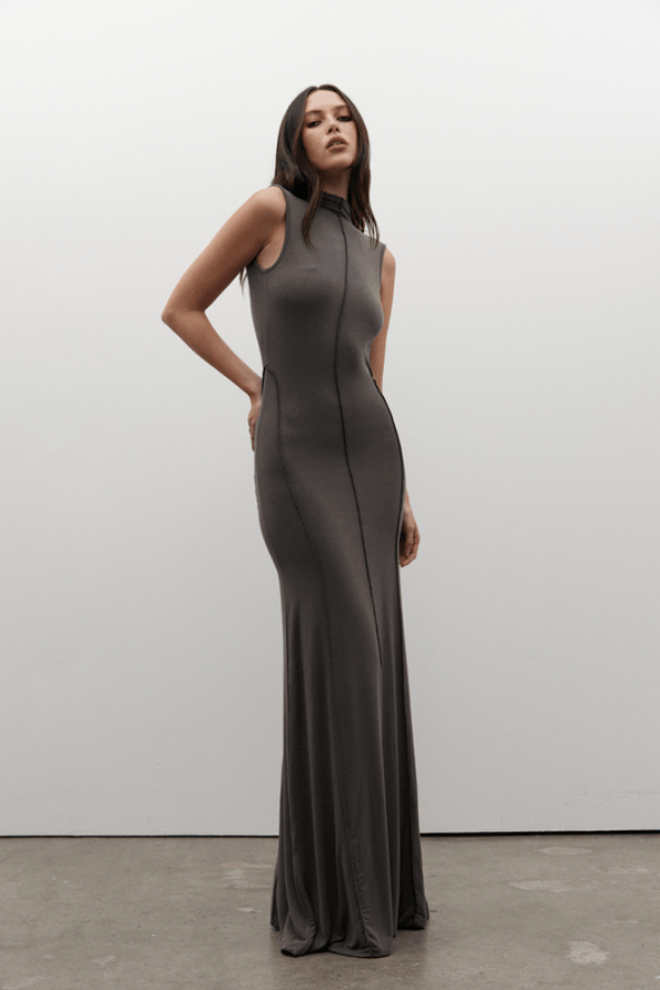 Mae Maxi Dress Smoke by Bayse – A sleek and trendy maxi with a high neckline and daring open back, flowing floor-length for chic evenings or special events.