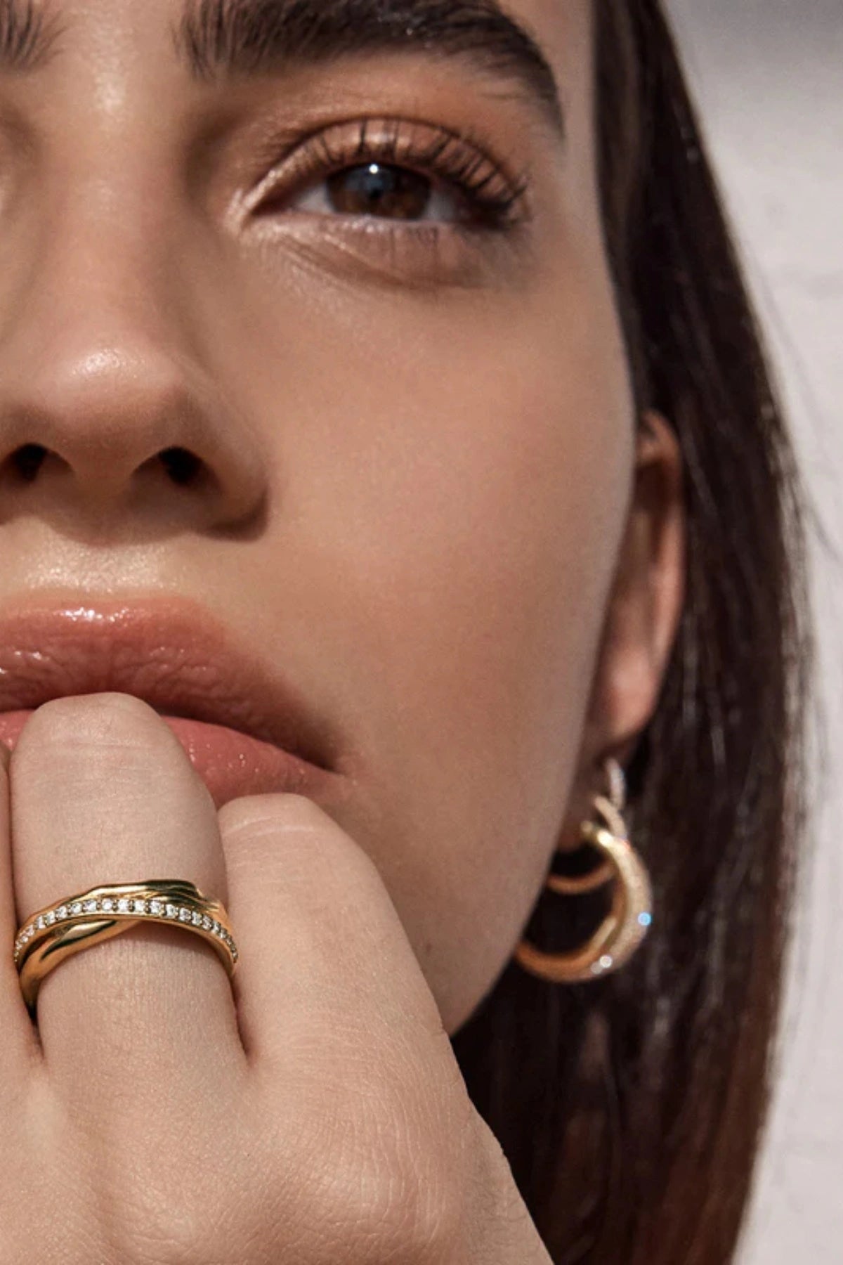 Entwined Hearts Ring by By Charlotte — a sterling silver double-band ring with CZ crystals, symbolising intertwined love and timeless elegance.