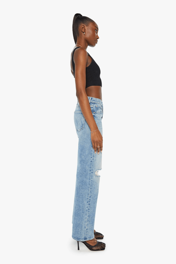 Mid Rise Maven Sneak Peak A Boo by Mother Denim, mid-rise relaxed wide-leg jeans with distressed knees, light-blue wash, perfect for casual cool style.