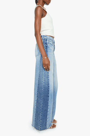 Pipe Dream Button Sneak Fray in Blinded By The Dark by MOTHER, Super high-rise rigid jeans with barrel-leg fit and frayed hem for vintage-meets-modern style.